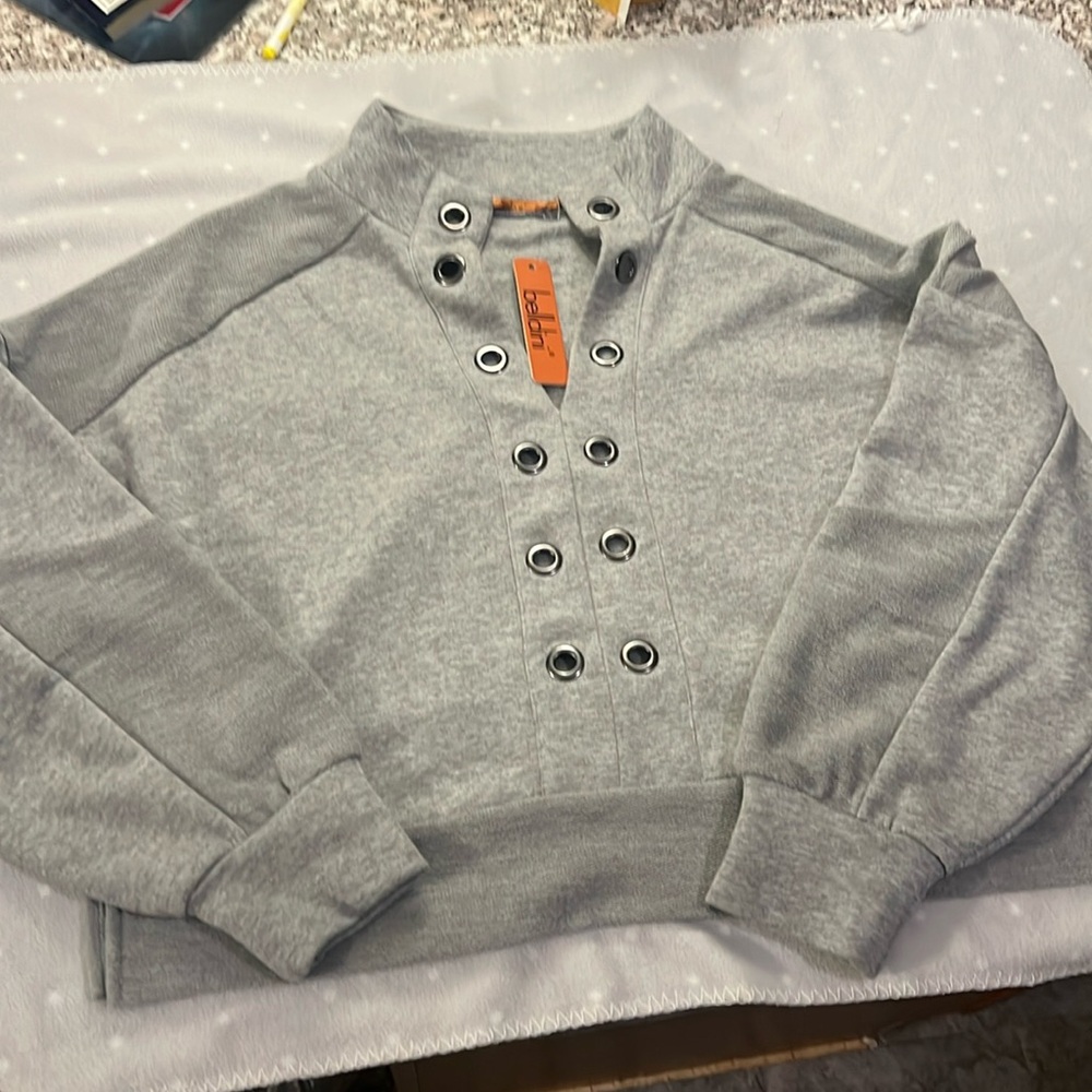 Medium belldini sweat shirt runs big